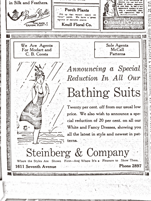 Eine Frau in einem weißen hochgeschlossenen Kleid mit langen Ärmeln und einem Dutt, die zentral in einer Werbung für Steinberg & Company's Badesachen steht, umgeben von Text.