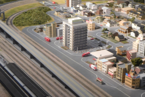 Ein Miniaturstadtmodell mit einem Zug auf Schienen, umgeben von Gebäuden, Bäumen, Straßen, Fahrzeugen, Strommasten und Gras, mit einem Wolkenkratzer im Hintergrund.