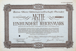 Altes deutsches Aktienzertifikat betitelt "Aktie über Einhundert Reichmark" für 100 Reichmarks mit schwarzem Rand.
